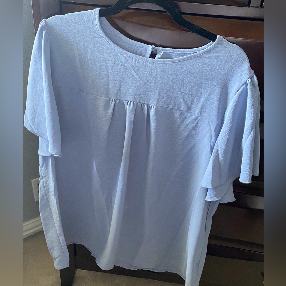 Cute blue blouse never worn